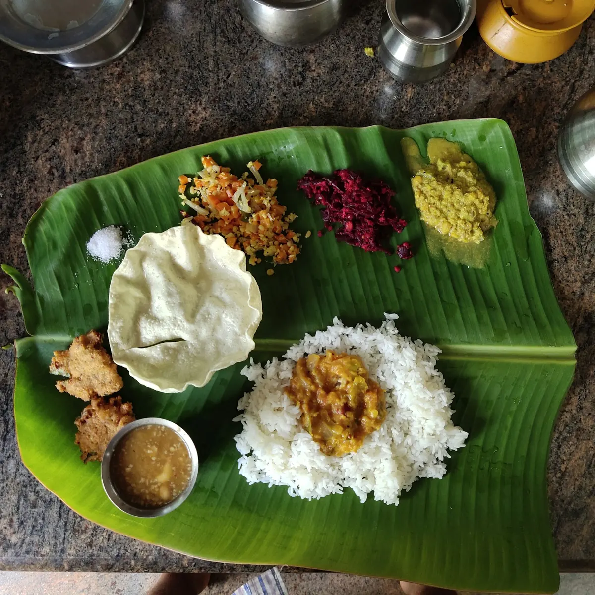 Kerala sadya on banana leaf — Shadhi Catering and Event Management